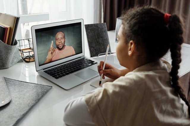 Student talking to a teacher in a video call