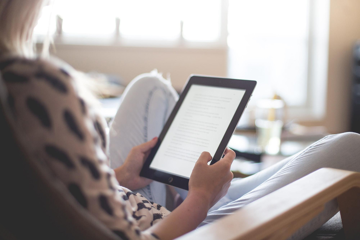 Student reading on a tablet